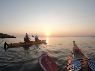 Sunset Kayaking Adventure along Vouliagmeni Coastline