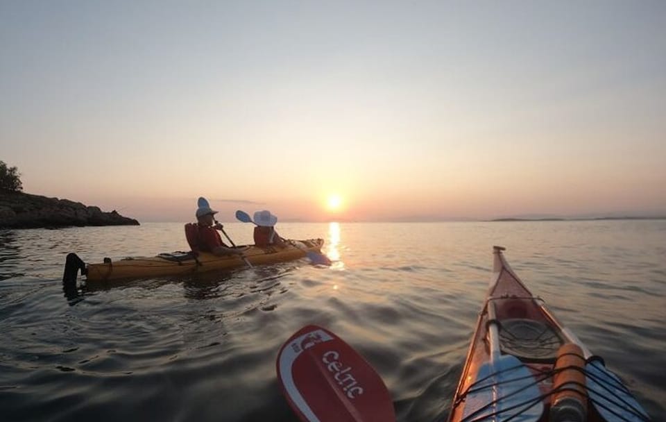 Sunset Kayaking Adventure along Vouliagmeni Coastline