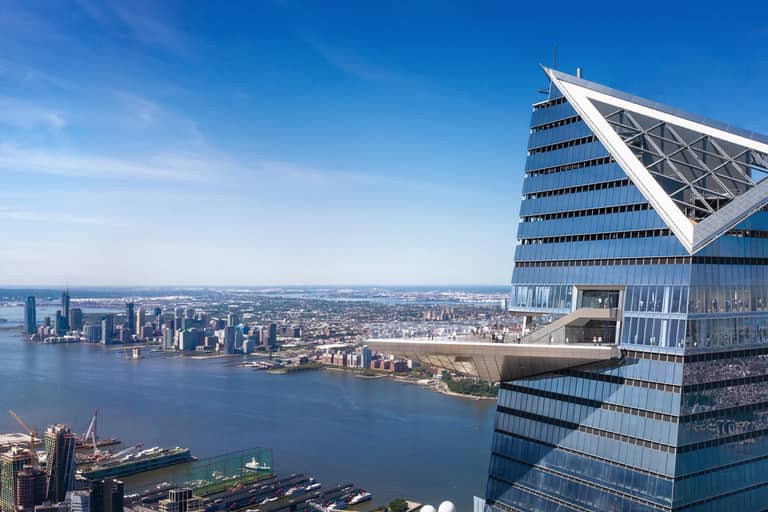 Edge Observation Deck view of Manhattan skyline, Hudson River, and New Jersey waterfront under clear blue sky