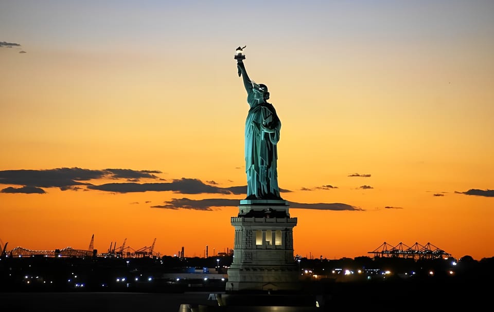 Sunset Skyline Cruise Near Statue of Liberty in New York