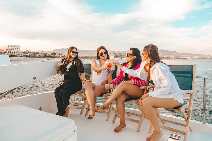 Toast your Cabo vacation with premium drinks and stunning sunset views aboard your private luxury yacht adventure!