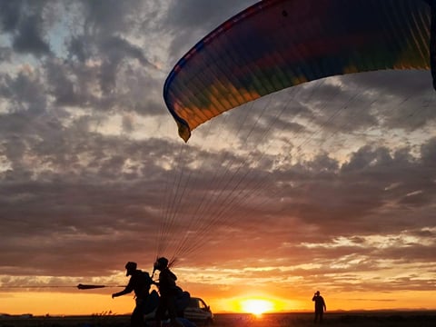 Tandem Paragliding over the Rugged Lava Fields at Blue Mountains, photo 2