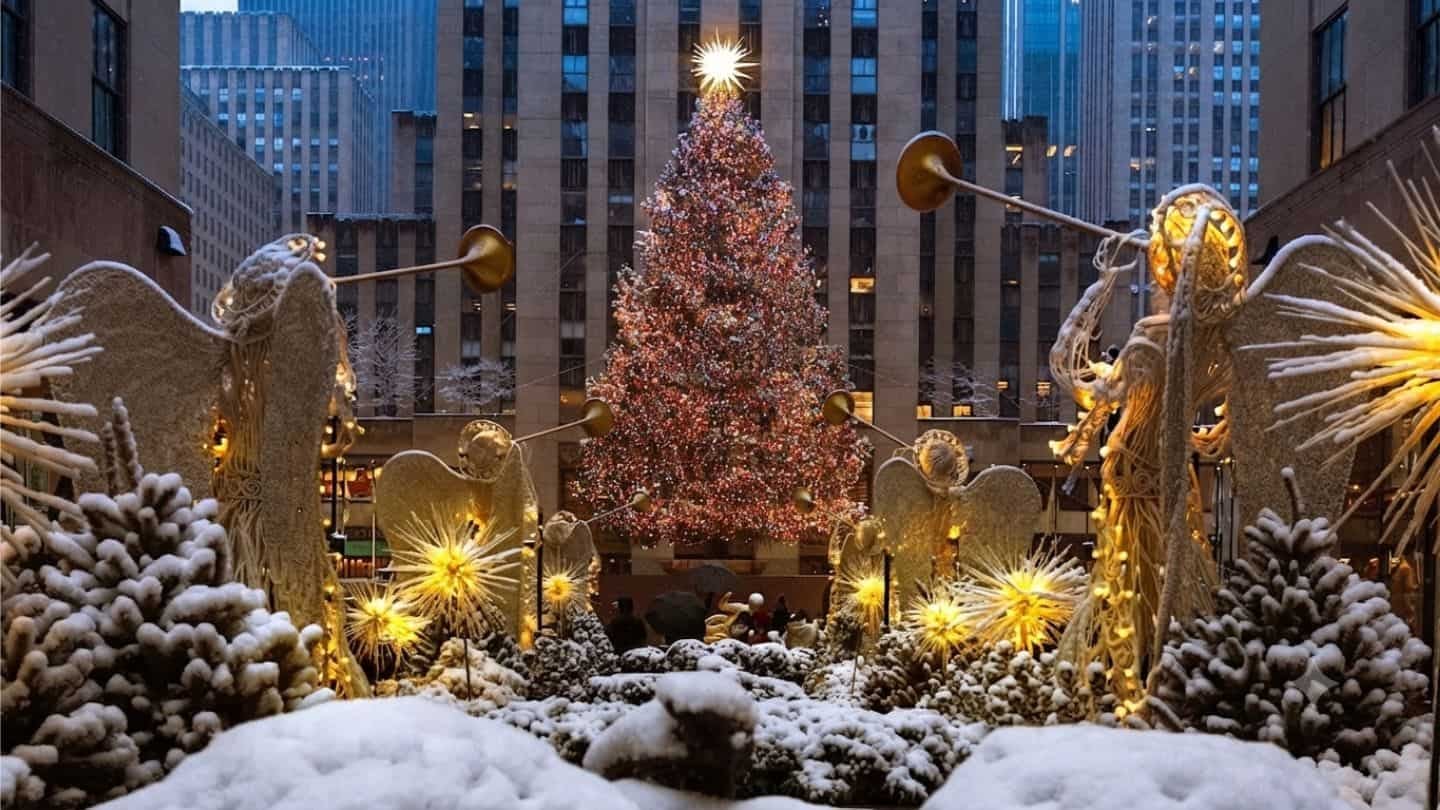 Rockefeller Center Christmas Tree in New York City lit up at night with festive lights