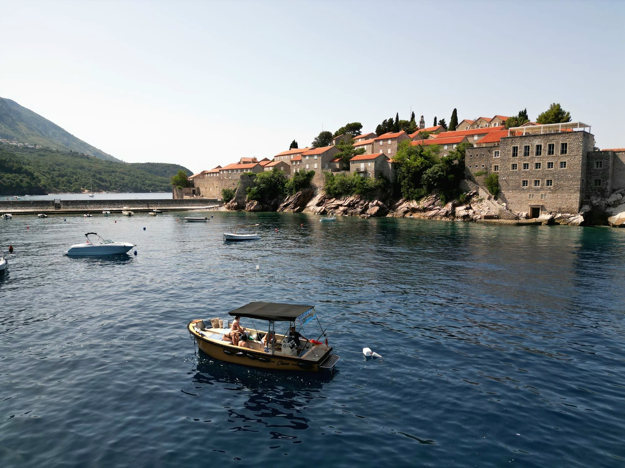 Pink sandy beaches and emerald waves surround the legendary Saint Stefan – a true Adriatic gem.