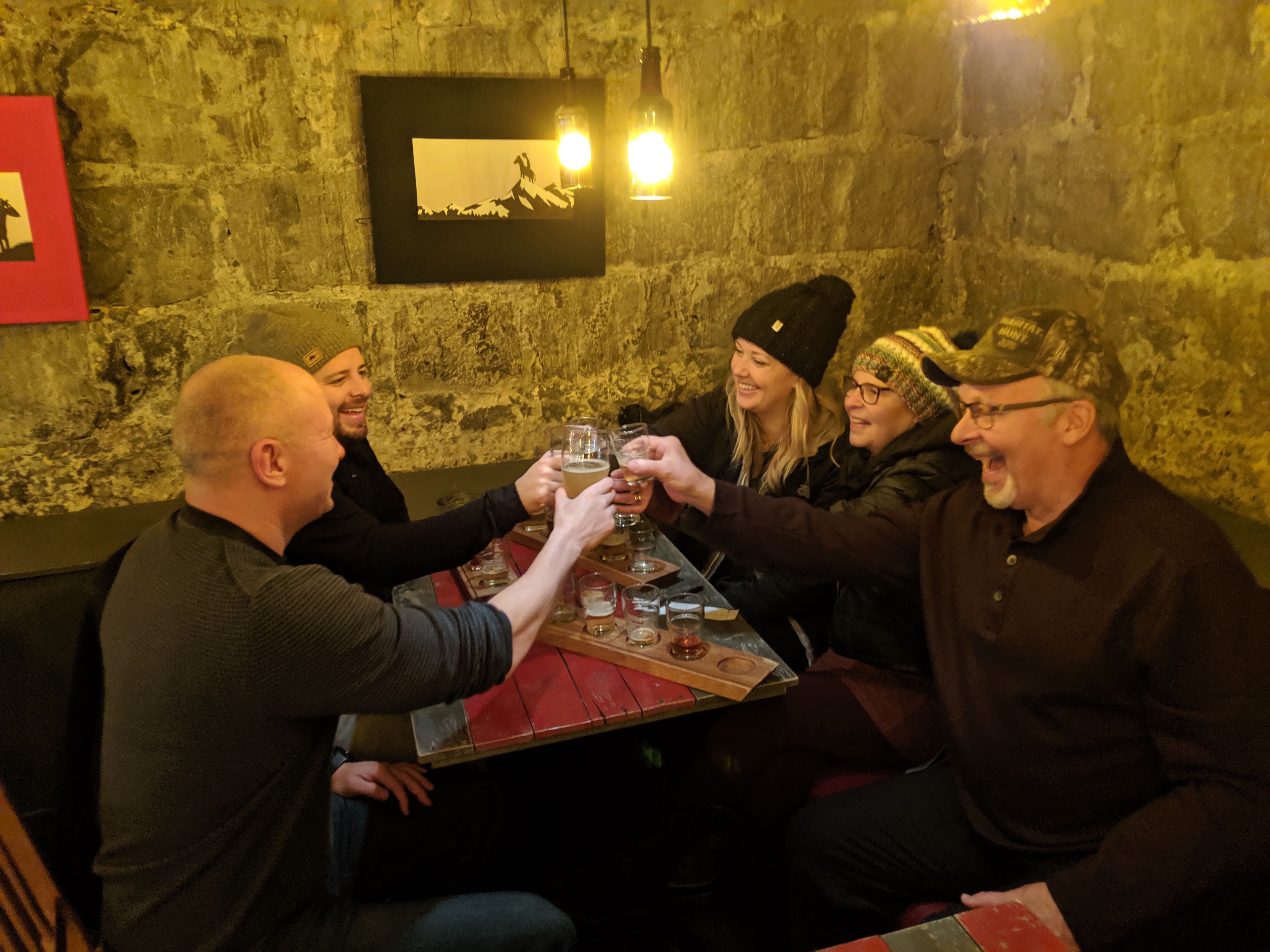 A group of friends enjoying drinks on The Reykjavik Beer & Booze Tour