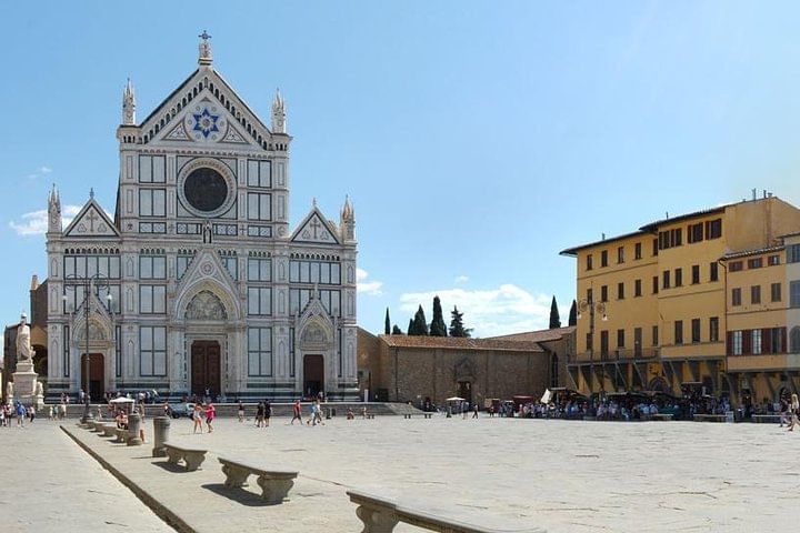 Wide view of Santa Croce Square with Santa Croce Church in the background