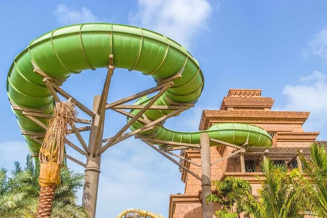 Experience the thrill of Aquaventure slides and the wonder of Lost Chambers Aquarium in Dubai."