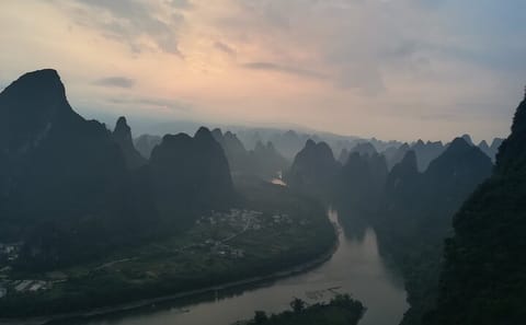 Li River Electric Boat and Yulong River Biking Tour in Guilin