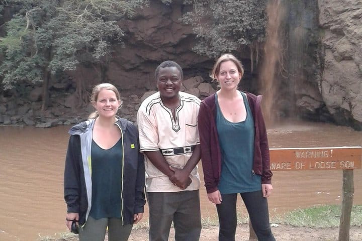 people visiting makalia waterfall