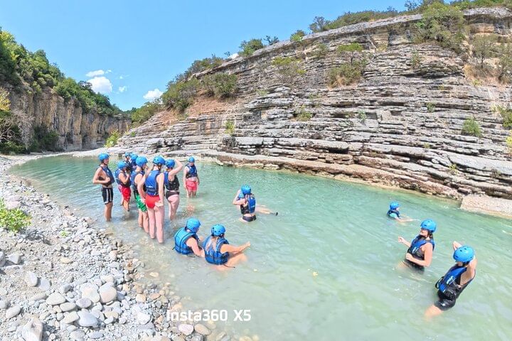 Floating , swimming , hiking , in the river .