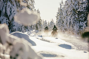 Snowmobiling adventure in Levi