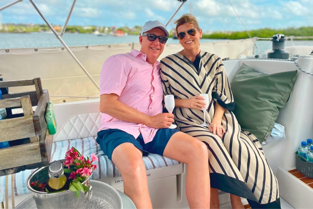 Romantic couple enjoying private sunset cruise in Curacao with Maxie Sailing