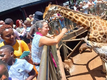 with our exited guest at the giraffe center