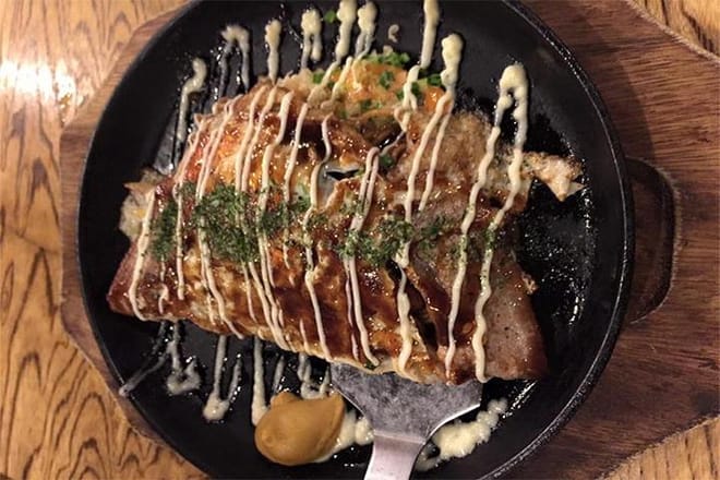Try okonomiyaki in a local izakaya
