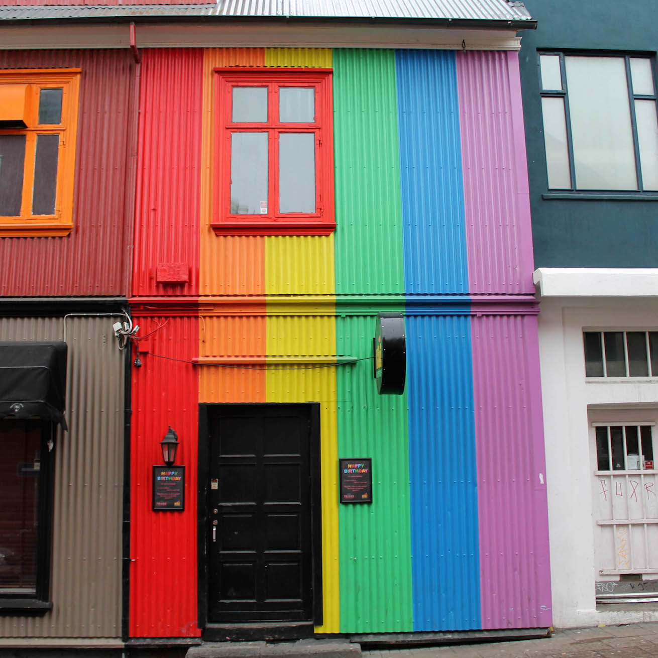 Rainbow coloured houses in downtown Reykjavik, celebrating Pride