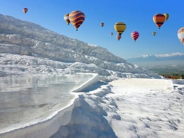 Hot air balloon over hot baths