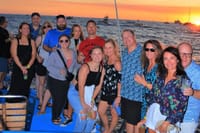 Capture unforgettable sunset moments with your group aboard a private Los Cabos catamaran—complete with open bar, great vibes, and stunning ocean views.