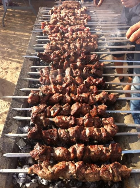 Camel riding with BBQ and sunset photo 6