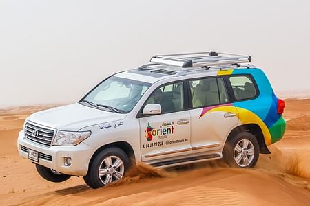 Dubai Desert Safari Adventure with BBQ Dinner & Camel Ride