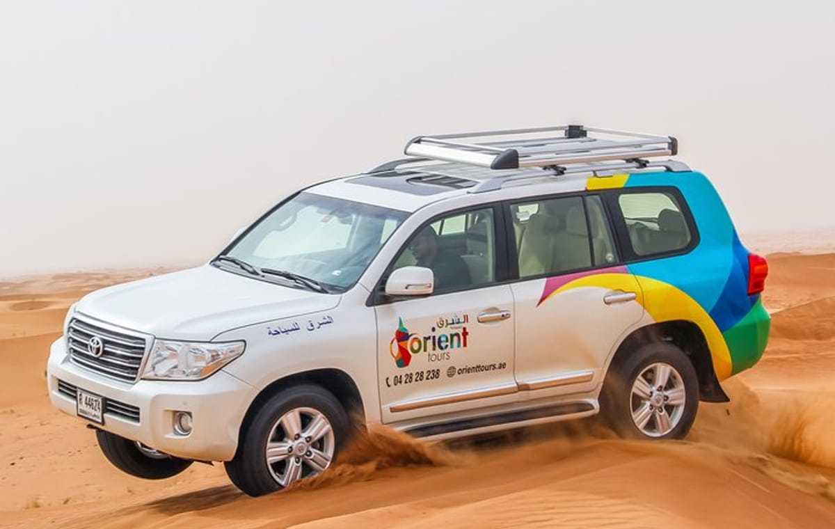 Premium Dubai Desert Safari with BBQ Dinner in the Red Dunes