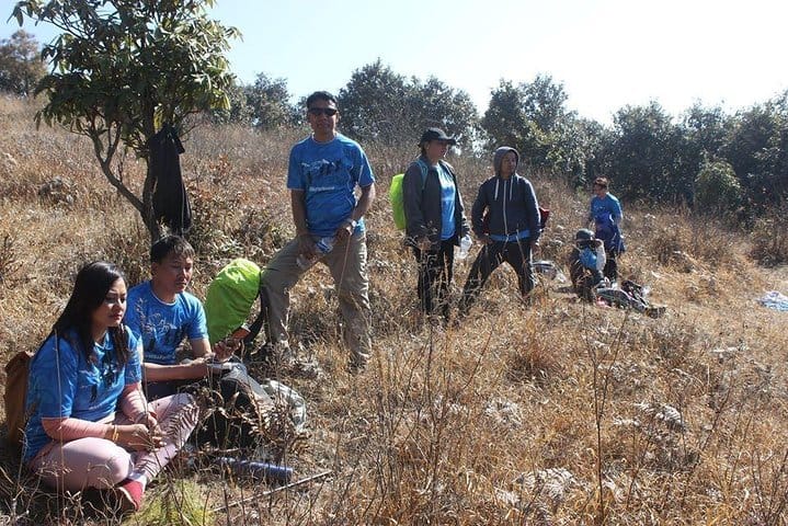 Hikers resting on their way to Chandragiri Hill.