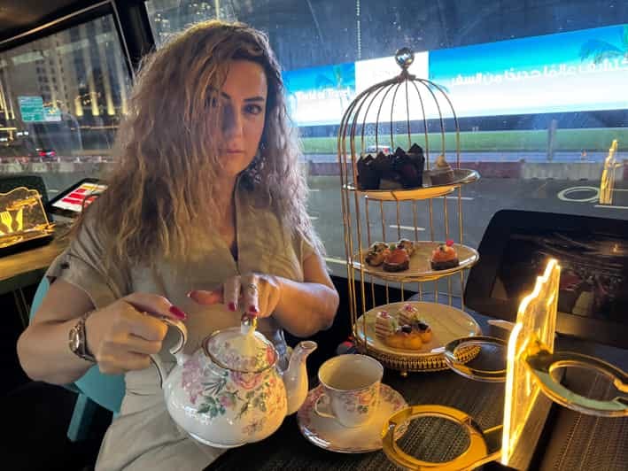 Dubai: Bustronomy Gourmet Brunch, Afternoon Tea, or Dinner on a Luxury Glass-Roof Bus!