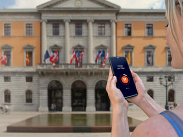 Visit Annecy on your own: Discover the Sardinian history of the city in front of the City Hall.