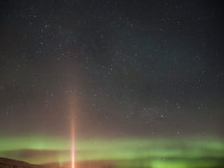 Aurora seen with the light of the imagine peace lighthouse