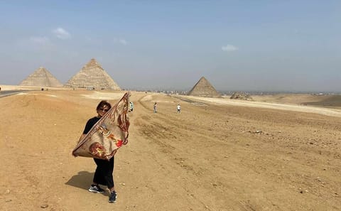 Cairo Desert Adventure: Camel Ride, Quad Biking, and Shopping