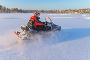 Small Group Snowmobile Driving in Nature
