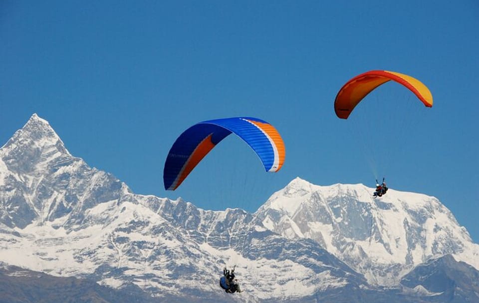 Paragliding Adventure Over Phewa Lake in Pokhara, Nepal