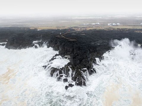 Ocean waves crashing into the Brimketill area in Reykjanes.