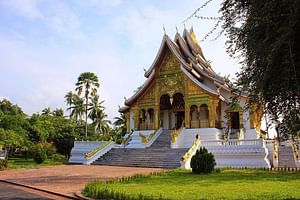 Full-Day Pak Ou Caves and Mekong River Bike and Boat Tour from Luang Prabang