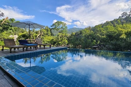 Chiang Mai 2-Day Adventure: Trekking, River Tubing & Waterfall Slide with Villa Stay