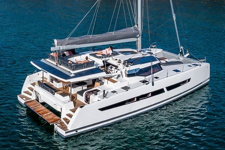 Exclusive Catamaran Cruise in Mykonos with Gourmet Meal & Drinks