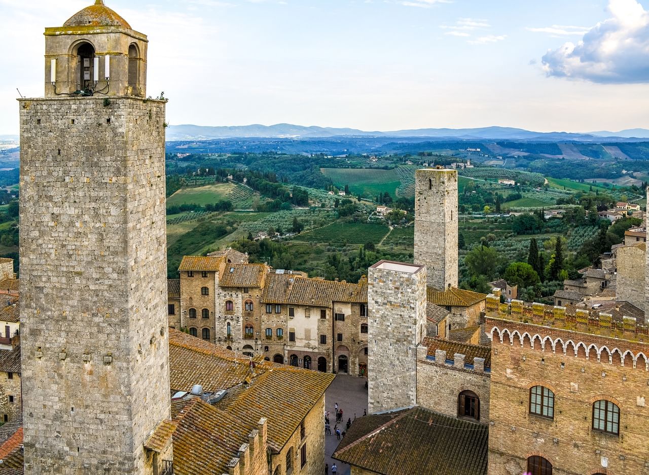 Aerial view of San Gimignano's medieval towers and a magnificent view of the surrounding landscape