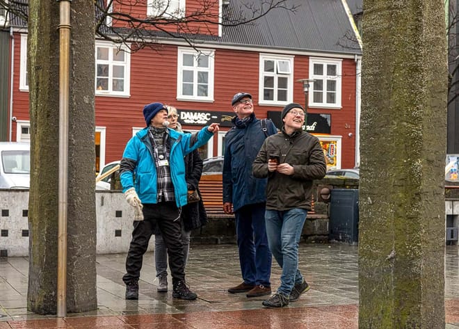 Our expert Guide giving a group of guests insight into the storied history of downtown Reykjavik