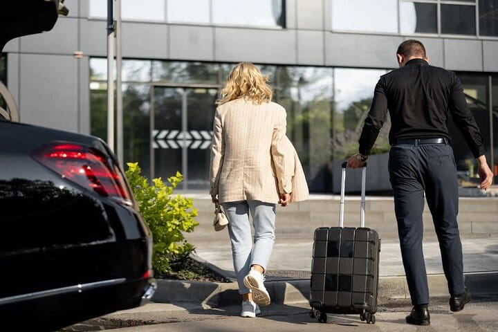 VIP meet‑and‑greet: name board in hotel lobby