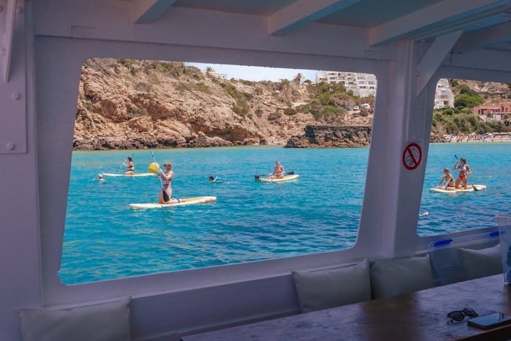 Ibiza Beach Hopper with Lunch Open Bar Paddle Surf and Snorkeling 8