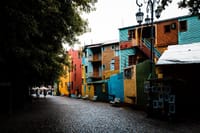 Visit the colorful Caminito Street in the La Boca neighborhood of Buenos Aires.