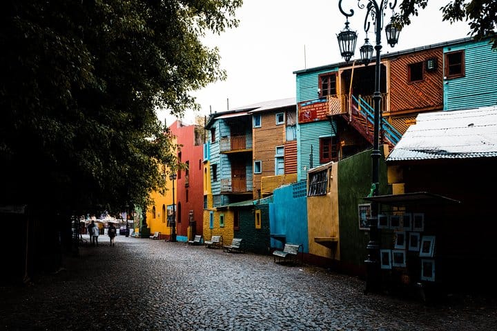 Visit the colorful Caminito Street in the La Boca neighborhood of Buenos Aires.