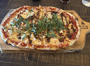 3-hour snowmobile experience with pizza in a hut restaurant