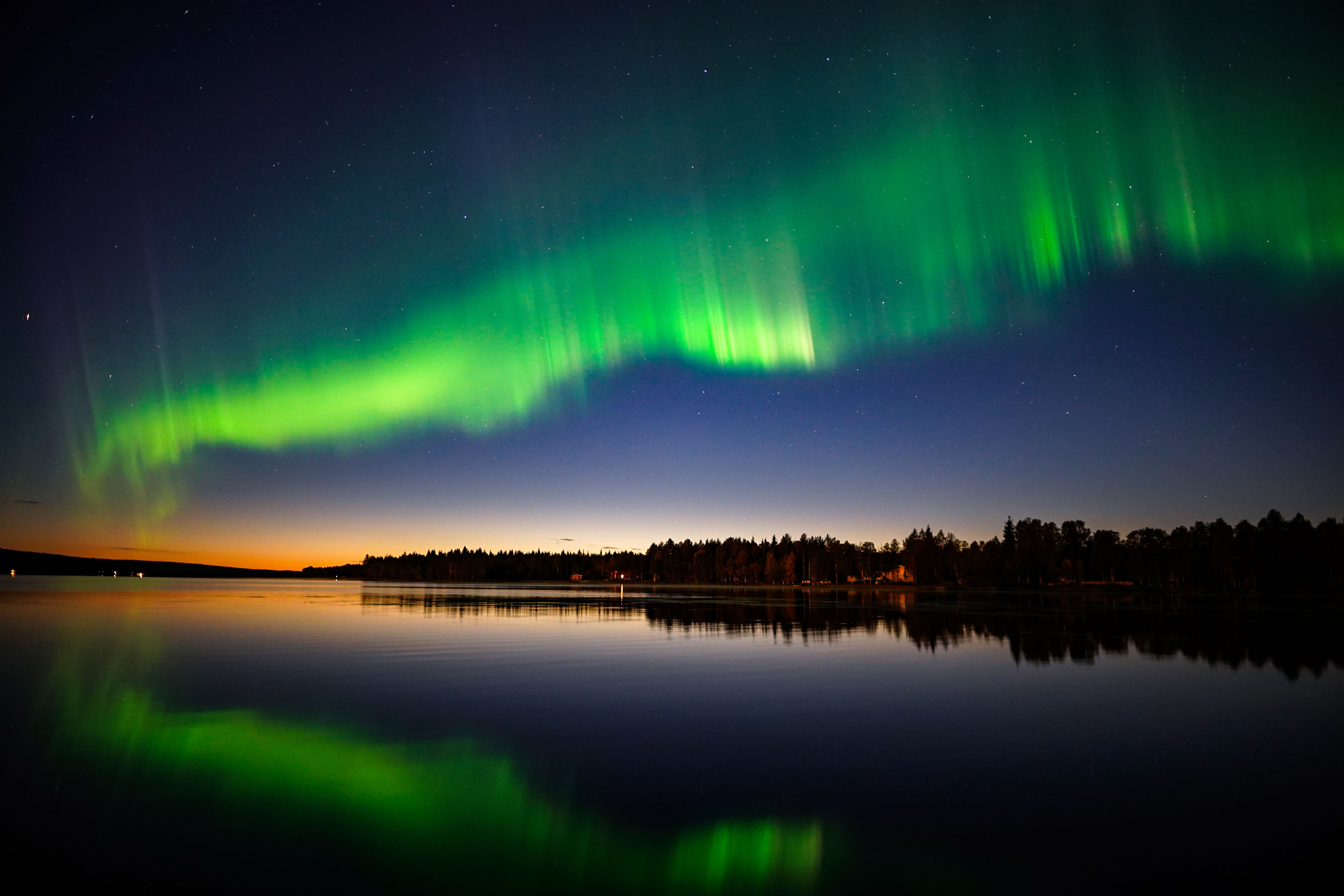 Northern Lights dancing in the sky above Lapland