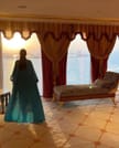 "Twilight charm: The Burj Al Arab's silhouette against the setting sun."