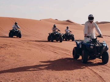 Qatar quad bike ATV ride and camel ride tour in doha by Falcon Tours Doha- Qatar