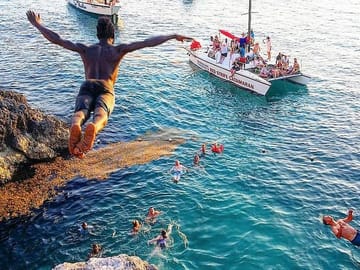 Professional cliff diver at Rick's Cafe