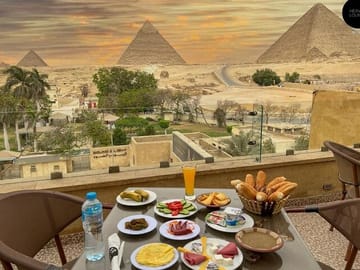 Pyramids View Restaurant Visit Egypt Viaje a Egipto Egypt Tours Kareem Egypt Guide Egypt Guide Pyramids Of Giza Private Tour Egypt Egypt Travel Package Local Guide in Egypt Tours in Egypt
