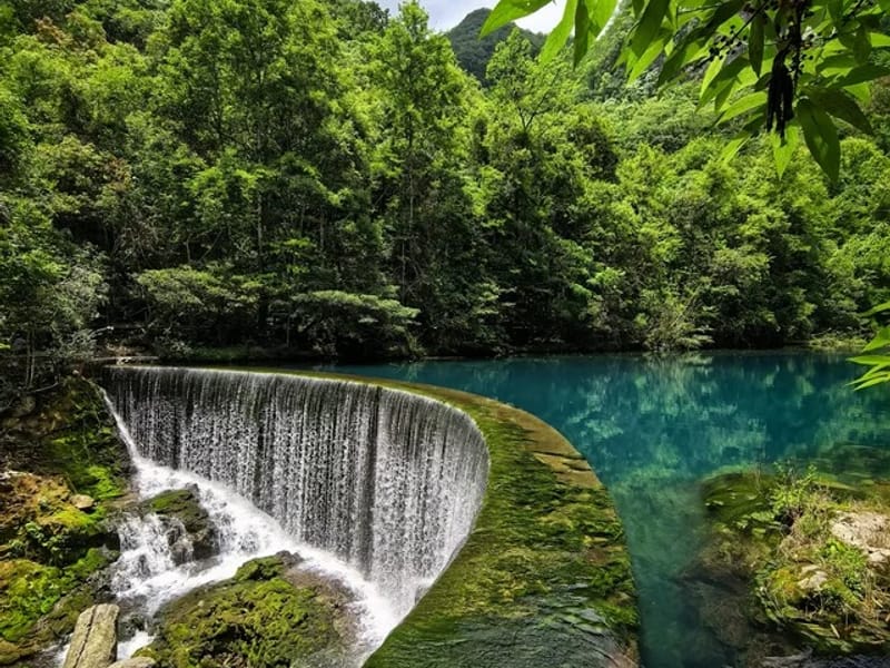 Day Tour to Libo Xiaoqikong UNESCO Karst from Libo