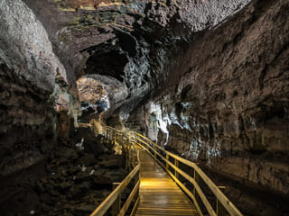 Looking backwards through Víðgelmir, showing the direct pathway guests take through the caves huge chambers.