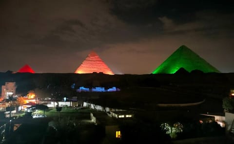 Evening Sound and Light Show at Giza Pyramids with Dinner